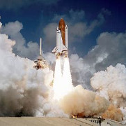 a space shuttle blasting off